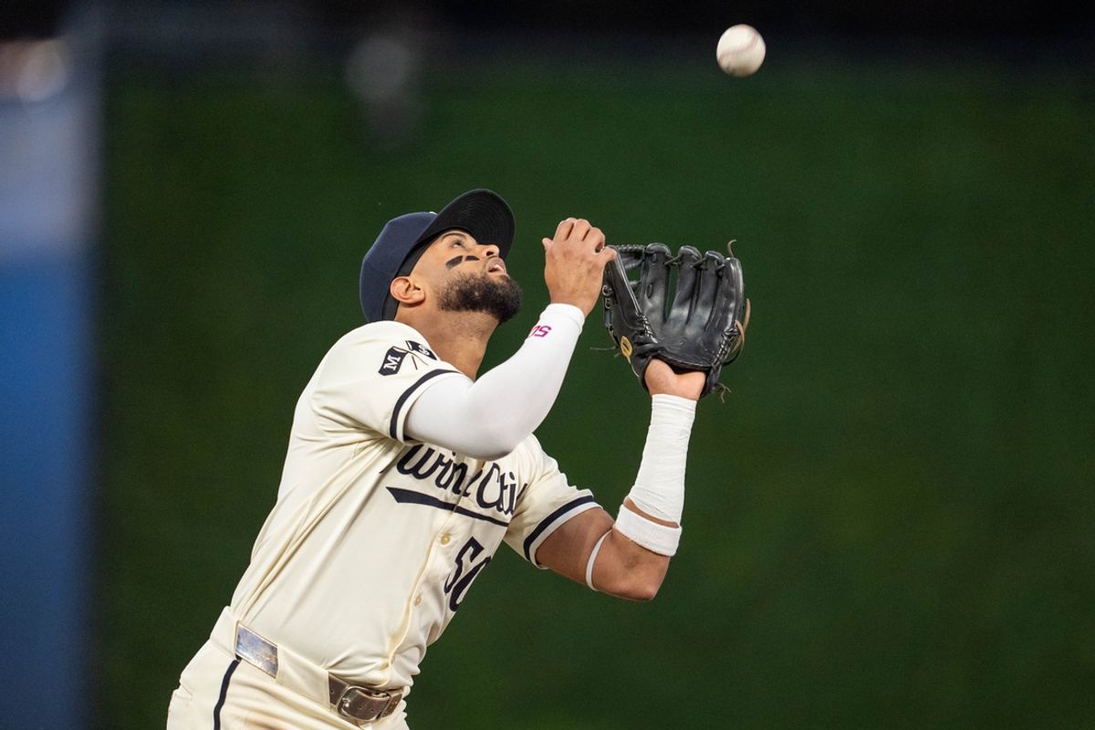 Sep 26, 2024; Minneapolis, Minnesota, USA; Minnesota Twins second base Willi Castro (50) catches a ball hit by Miami Marlins catcher Nick Fortes (4) ending the third inning at Target Field. Mandatory Credit: Matt Blewett-Imagn Images