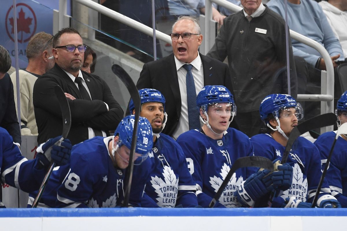 Sep 26, 2024; Toronto, Ontario, CAN;  Toronto Maple Leafs head coach Craig Berube speaks to his players in the third period against the Montreal Canadiens at Scotiabank Arena. Mandatory Credit: Dan Hamilton-Imagn Images