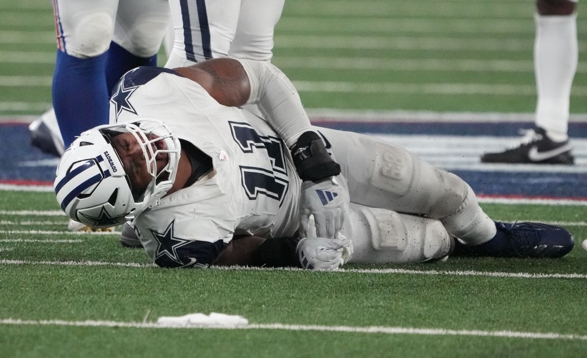 Sep 26, 2024; East Rutherford, New Jersey, USA;  Dallas Cowboys linebacker Micah Parsons (11) injured in the second half against the New York Giants at MetLife Stadium. Mandatory Credit: Robert Deutsch-Imagn Images