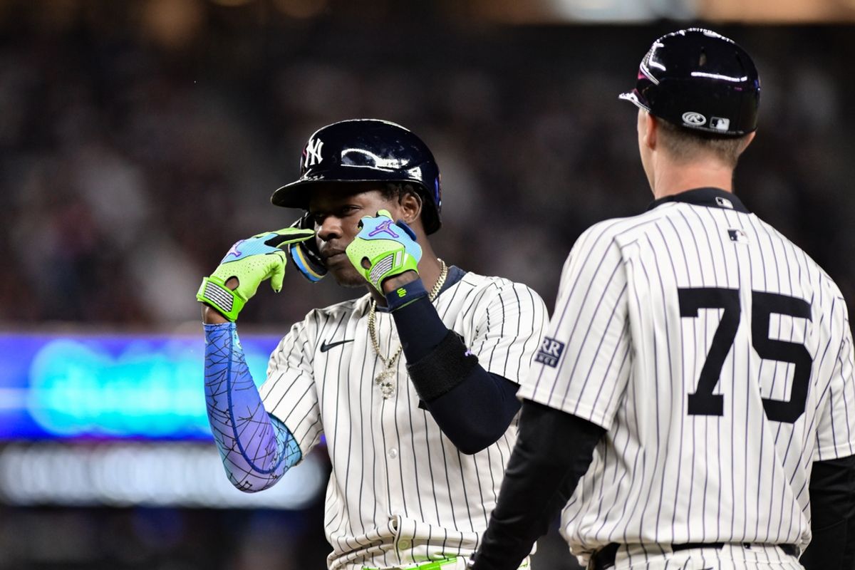 Sep 27, 2024; Bronx, New York, USA; New York Yankees third baseman Jazz Chisholm Jr. (13) reacts after hitting a two RBI single against the Pittsburgh Pirates during the fifth inning at Yankee Stadium. Mandatory Credit: John Jones-Imagn Images