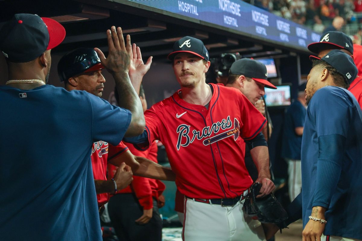Sep 27, 2024; Atlanta, Georgia, USA; Atlanta Braves starting pitcher Max Fried (54) is congratulated by teammates after being removed from a game against the Kansas City Royals in the ninth inning at Truist Park. Mandatory Credit: Brett Davis-Imagn Images