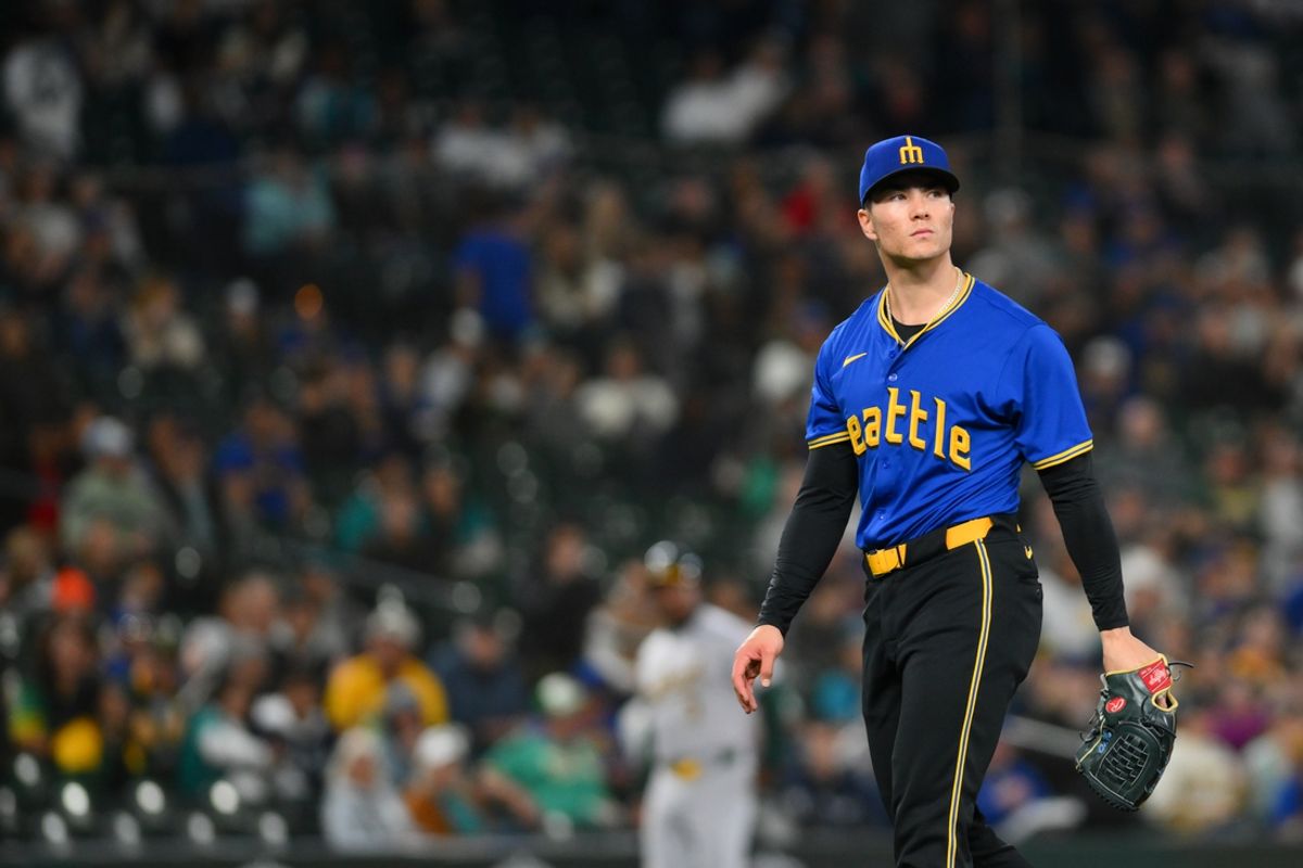 Sep 27, 2024; Seattle, Washington, USA; Seattle Mariners starting pitcher Bryan Woo (22) during the first inning against the Oakland Athletics at T-Mobile Park. Mandatory Credit: Steven Bisig-Imagn Images