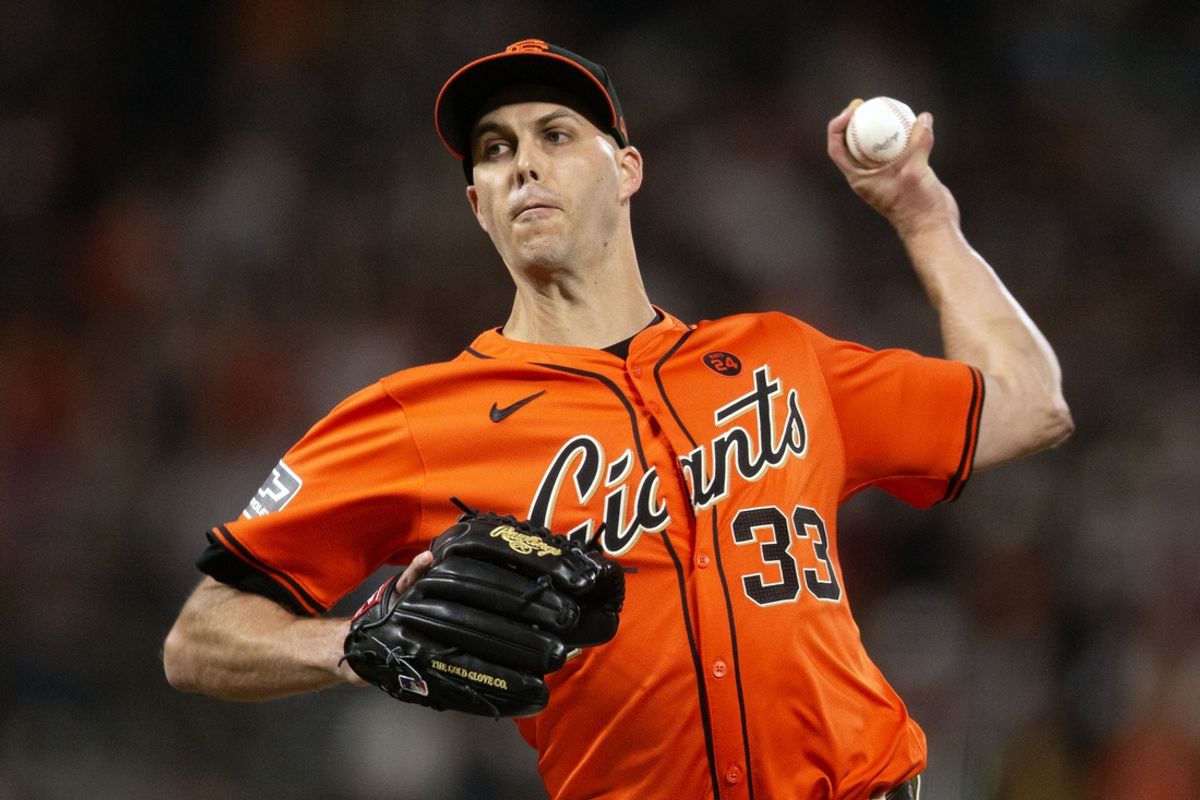 Sep 27, 2024; San Francisco, California, USA; San Francisco Giants pitcher Taylor Rogers (33) delivers a pitch against the St. Louis Cardinals during the fourth inning at Oracle Park. Mandatory Credit: D. Ross Cameron-Imagn Images