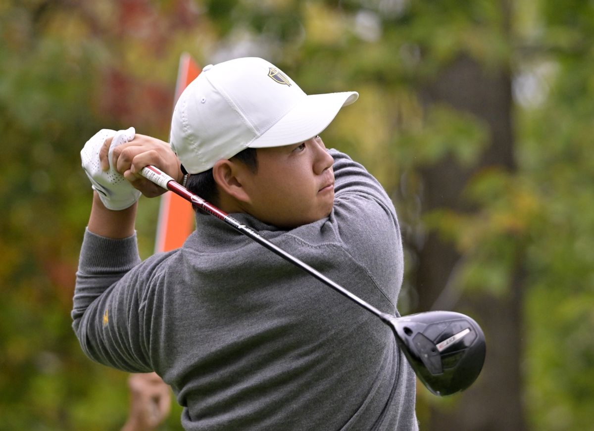 Sep 28, 2024; Ile Bizard, Quebec, CAN; Tom Kim of the International team tees off on the fourth hole during the third round of The Presidents Cup golf tournament. Mandatory Credit: Eric Bolte-Imagn Images