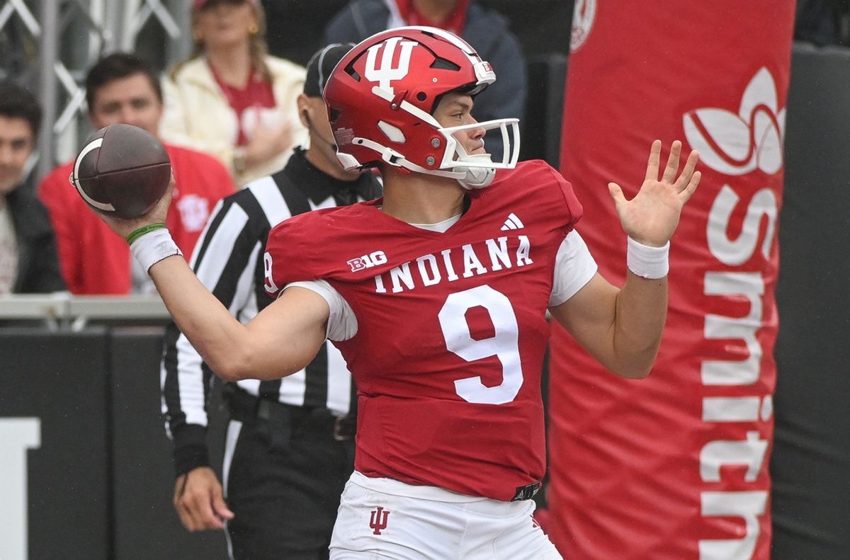 Sep 28, 2024; Bloomington, Indiana, USA;  Indiana Hoosiers quarterback Kurtis Rourke (9) throws a pass against the Maryland Terrapins during the first half at Memorial Stadium. Mandatory Credit: Robert Goddin-Imagn Images