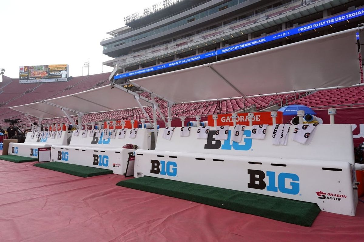 Sep 28, 2024; Los Angeles, California, USA; Dragon seats with the Big Ten conference logo on the Wisconsin Badgers team benches are seen before a game between the Wisconsin Badgers and the USC Trojans at United Airlines Field at Los Angeles Memorial Coliseum. Mandatory Credit: Kirby Lee-Imagn Images