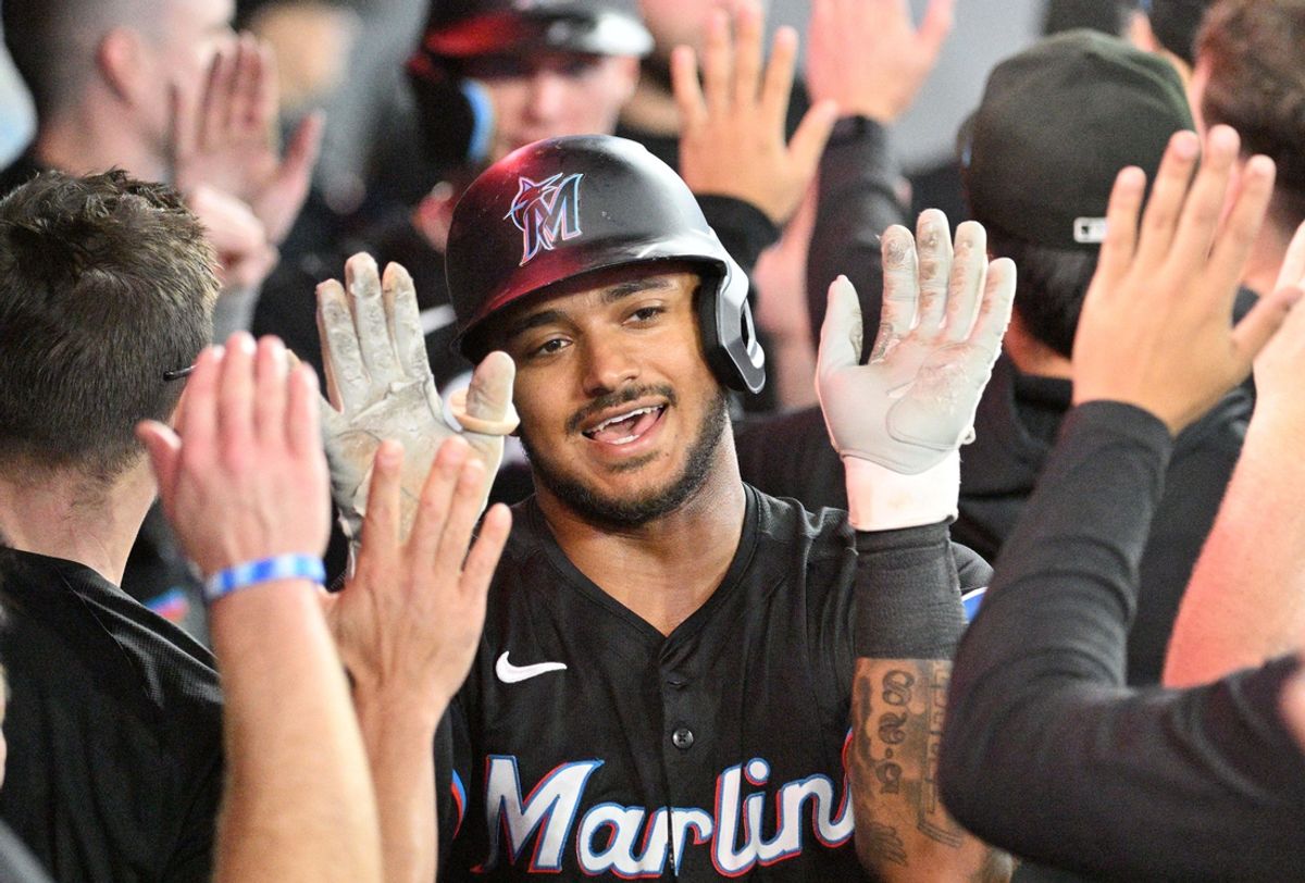 Sep 28, 2024; Toronto, Ontario, CAN;   Miami Marlins center fielder Dane Myers (54) celebrates with team mates in the dugout after hitting a three run home run against the Toronto Blue Jays in the eighth inning at Rogers Centre. Mandatory Credit: Dan Hamilton-Imagn Images
