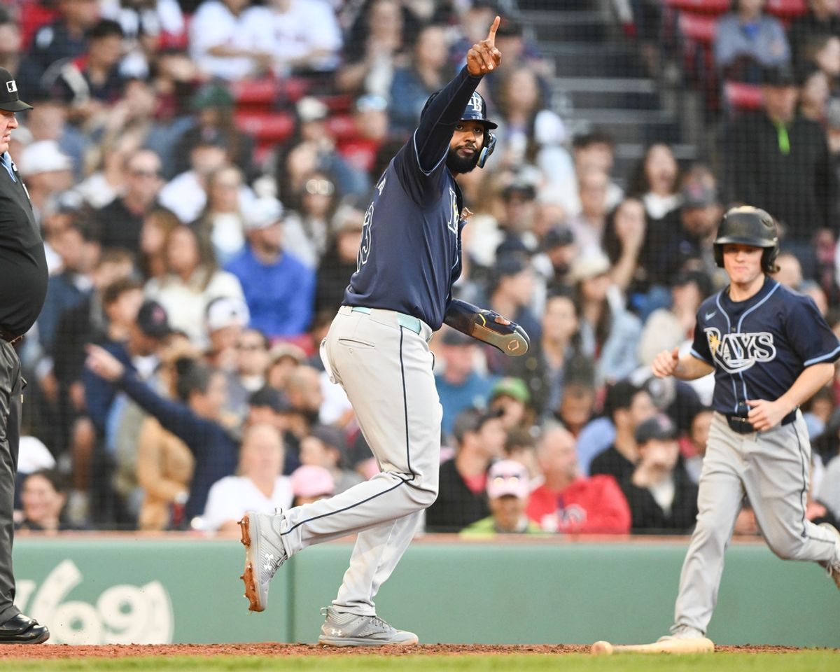 Sep 28, 2024; Boston, Massachusetts, USA; Tampa Bay Rays shortstop Junior Caminero (13) reacts after scoring a run against the Boston Red Sox during the fifth inning at Fenway Park. Mandatory Credit: Brian Fluharty-Imagn Images