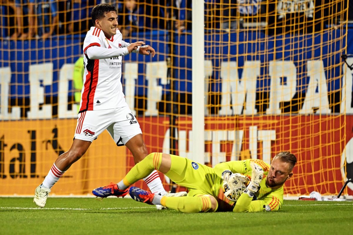 Sep 28, 2024; Montreal, Quebec, CAN; CF Montreal goalkeeper Jonathan Sirois (40) makes a save against San Jose Earthquakes midfielder Hernan Lopez (23) during the first half at Stade Saputo. Mandatory Credit: David Kirouac-Imagn Images