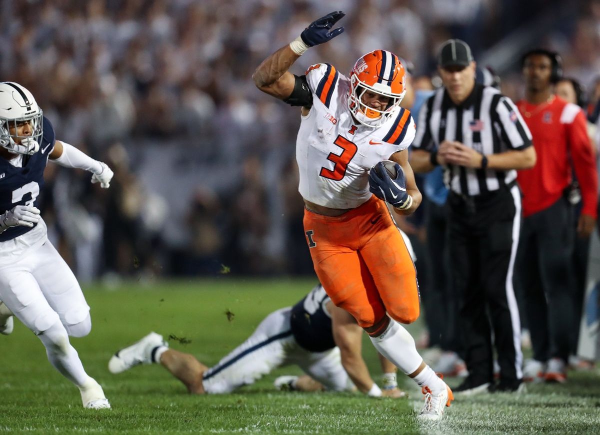 Sep 28, 2024; University Park, Pennsylvania, USA; Illinois Fighting Illini running back Kaden Feagin (3) runs during the first quarter against the Penn State Nittany Lions at Beaver Stadium. Mandatory Credit: Matthew O'Haren-Imagn Images