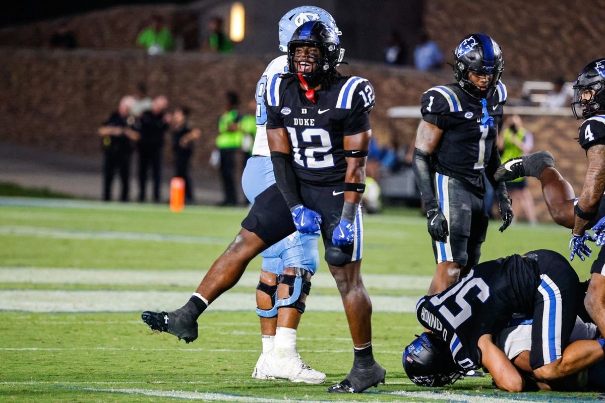 Sep 28, 2024; Durham, North Carolina, USA;  Duke Blue Devils linebacker Tre Freeman (12) celebrates during the second half of the game against North Carolina Tar Heels at Wallace Wade Stadium. Mandatory Credit: Jaylynn Nash-Imagn Images
