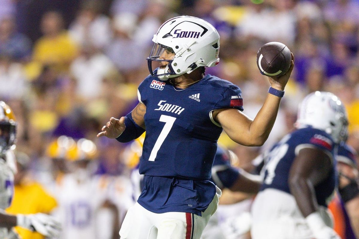 Sep 28, 2024; Baton Rouge, Louisiana, USA;  South Alabama Jaguars quarterback Gio Lopez (7) throws against the LSU Tigers during the second quarter at Tiger Stadium. Mandatory Credit: Stephen Lew-Imagn Images