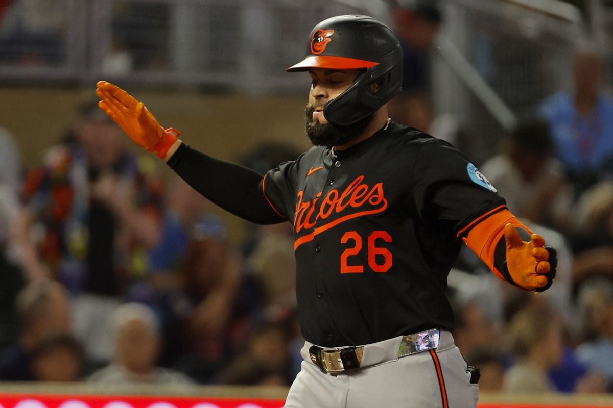 Sep 28, 2024; Minneapolis, Minnesota, USA; Baltimore Orioles third baseman Emmanuel Rivera (26) celebrates his solo home run against the Minnesota Twins in the fifth inning at Target Field. Mandatory Credit: Bruce Kluckhohn-Imagn Images