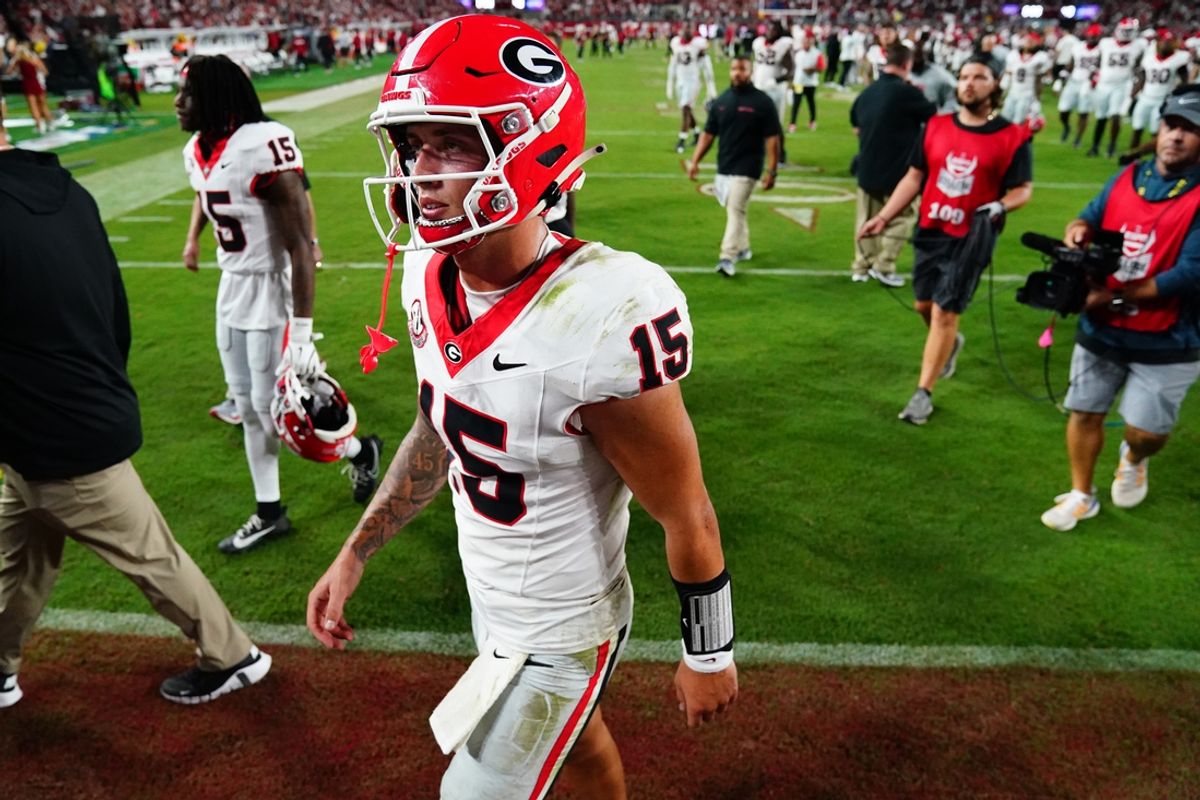 Sep 28, 2024; Tuscaloosa, Alabama, USA;  Georgia Bulldogs quarterback Carson Beck (15) leaves the field after a loss to the Alabama Crimson Tide at Bryant-Denny Stadium. Mandatory Credit: John David Mercer-Imagn Images