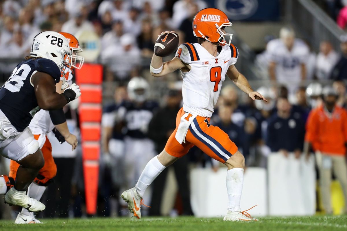 Sep 28, 2024; University Park, Pennsylvania, USA; Illinois Fighting Illini quarterback Luke Altmyer (9) throws during the third quarter against the Penn State Nittany Lions at Beaver Stadium. Penn State defeated Illinois 21-7. Mandatory Credit: Matthew O'Haren-Imagn Images