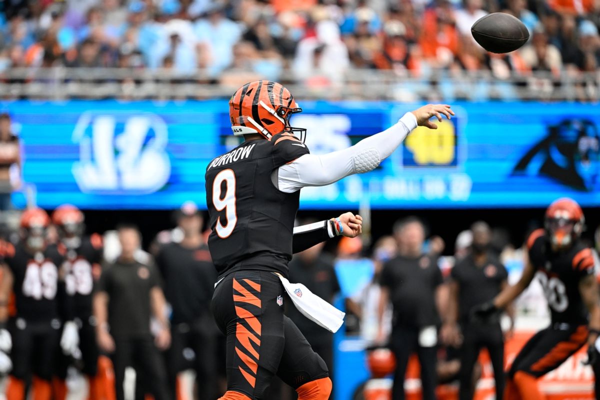 Sep 29, 2024; Charlotte, North Carolina, USA;  Cincinnati Bengals quarterback Joe Burrow (9) passes in the second quarter at Bank of America Stadium. Mandatory Credit: Bob Donnan-Imagn Images