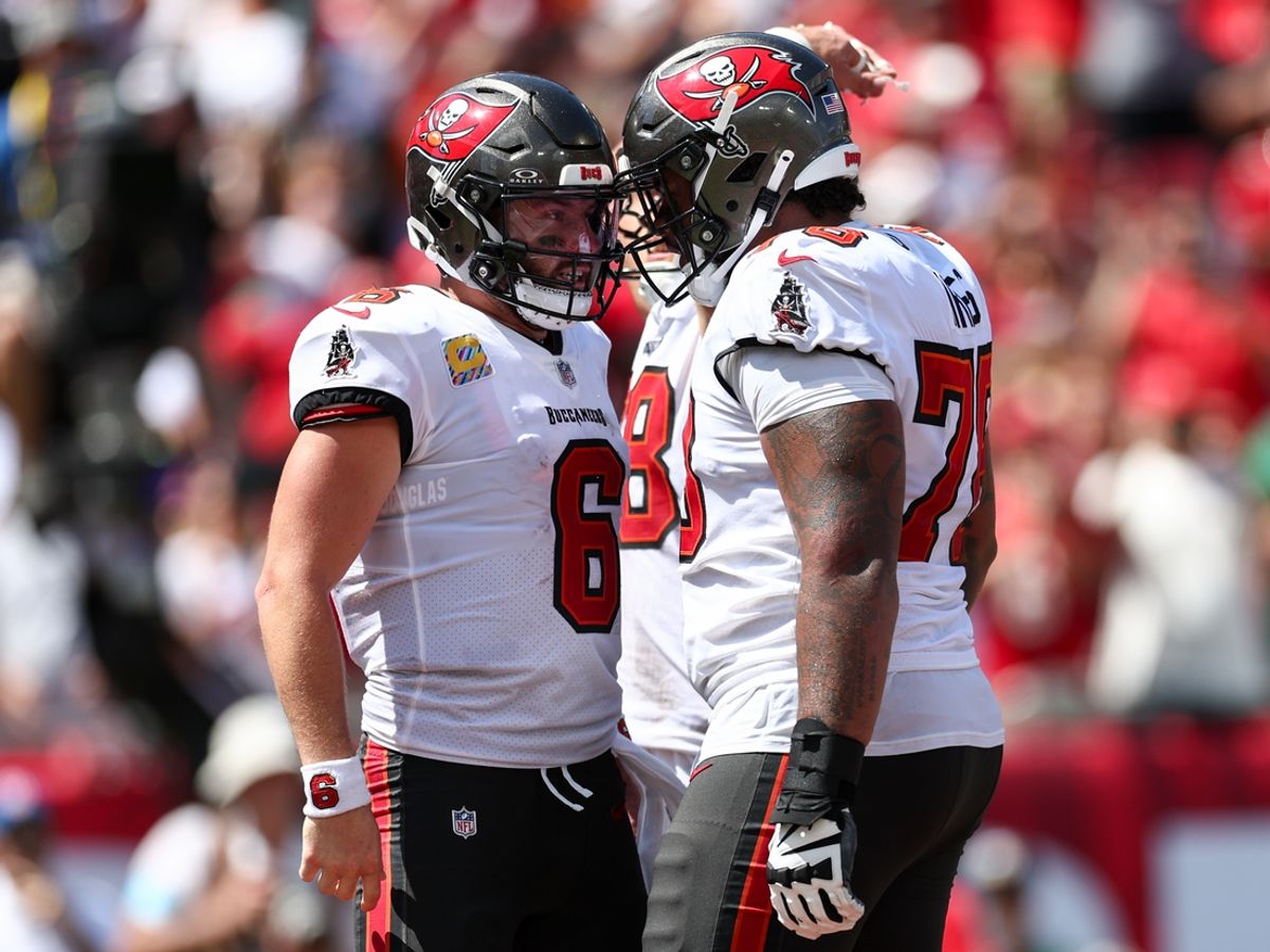Sep 29, 2024; Tampa, Florida, USA; Tampa Bay Buccaneers offensive tackle Tristan Wirfs (78) congratulates quarterback Baker Mayfield (6) after a touchdown against the Philadelphia Eagles in the second quarter at Raymond James Stadium. Mandatory Credit: Nathan Ray Seebeck-Imagn Images