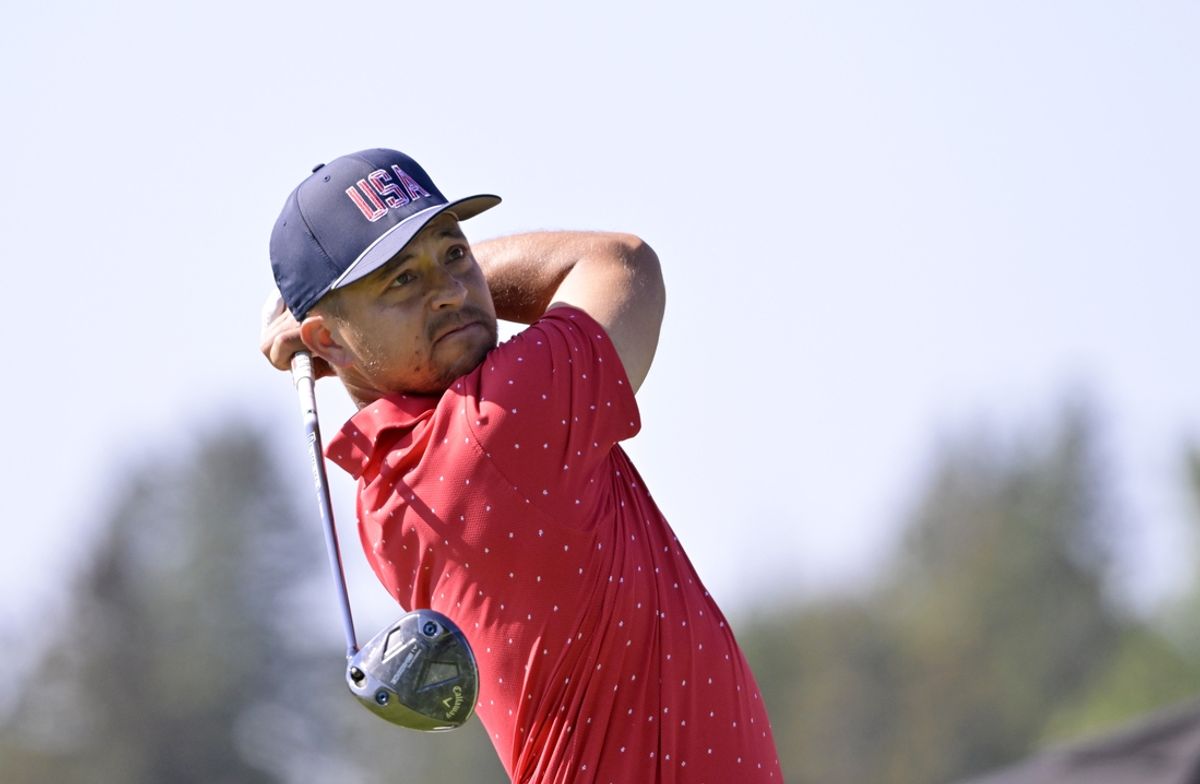 Sep 29, 2024; Ile Bizard, Quebec, CAN; Xander Schauffele of team U.S.A. hits on the tee of the second hole in singles match during the final round of The Presidents Cup golf tournament. Mandatory Credit: Eric Bolte-Imagn Images