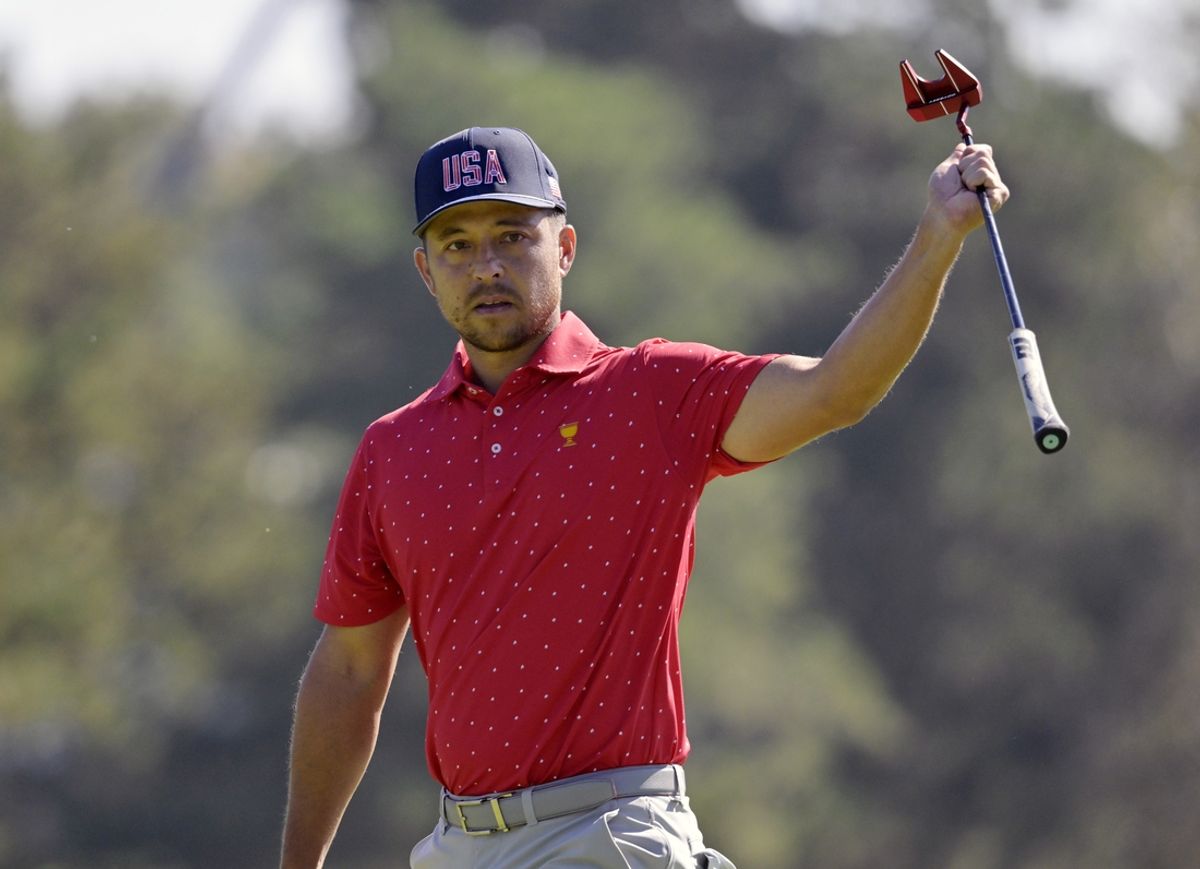Sep 29, 2024; Ile Bizard, Quebec, CAN; Xander Schauffele of team U.S.A. reacts after putting on the green of the first hole in singles match during the final round of The Presidents Cup golf tournament. Mandatory Credit: Eric Bolte-Imagn Images