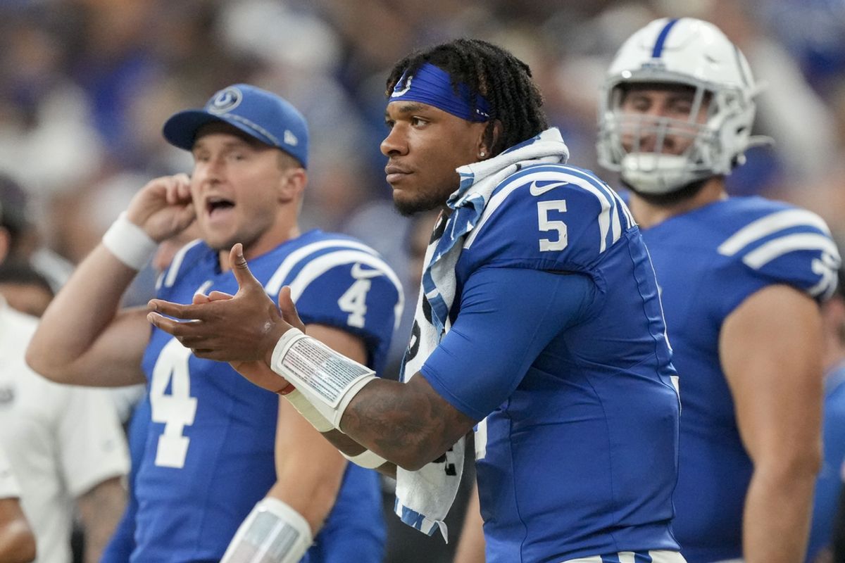 Sep 29, 2024; Indianapolis, Indiana, USA;  Indianapolis Colts quarterback Anthony Richardson (5) watches the action on the field from the sideline Sunday, Sept. 29, 2024, during a game against the Pittsburgh Steelers at Lucas Oil Stadium in Indianapolis. Mandatory Credit: Christine Tannous-USA TODAY Network via Imagn Images