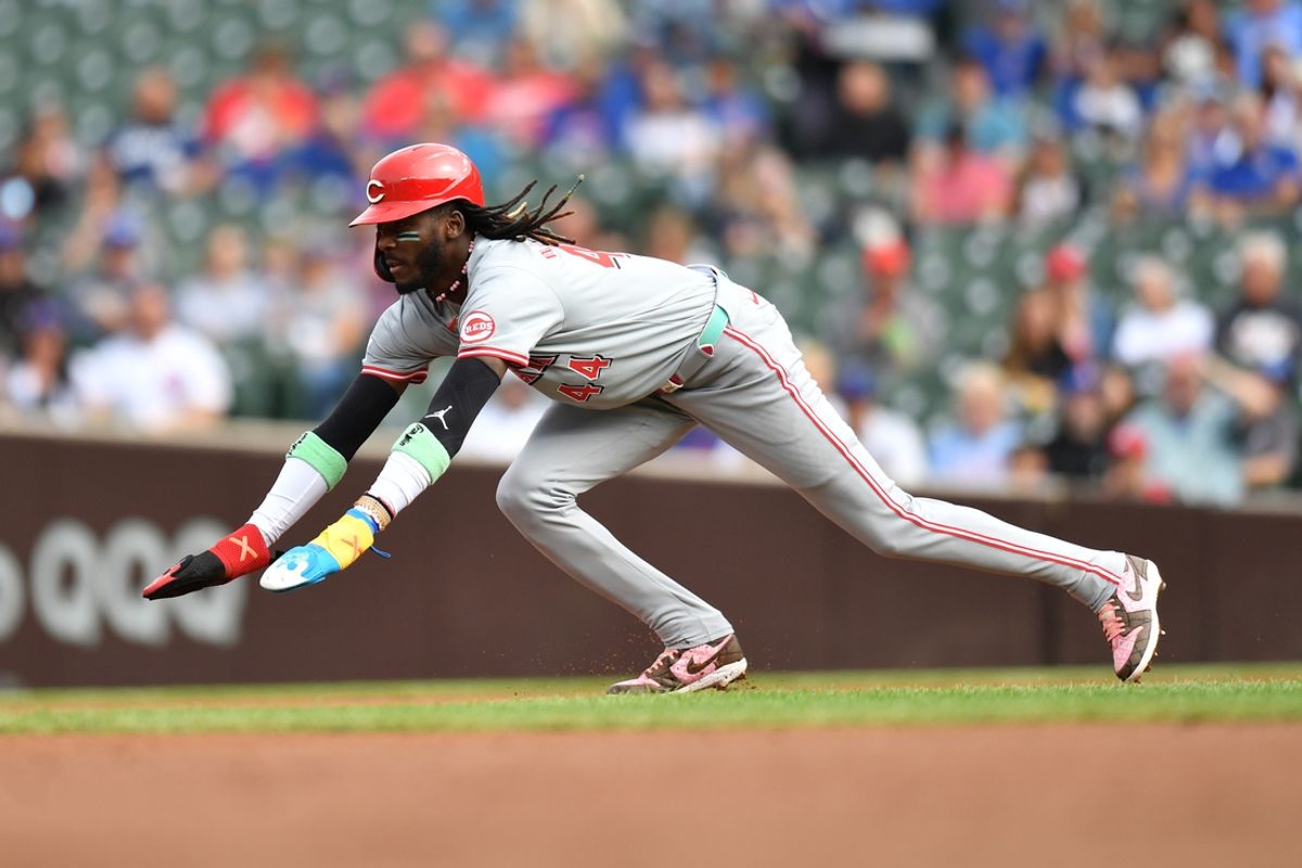 Sep 29, 2024; Chicago, Illinois, USA; Cincinnati Reds shortstop Elly De La Cruz (44) steals second base during the first inning against the Chicago Cubs at Wrigley Field. Mandatory Credit: Patrick Gorski-Imagn Images