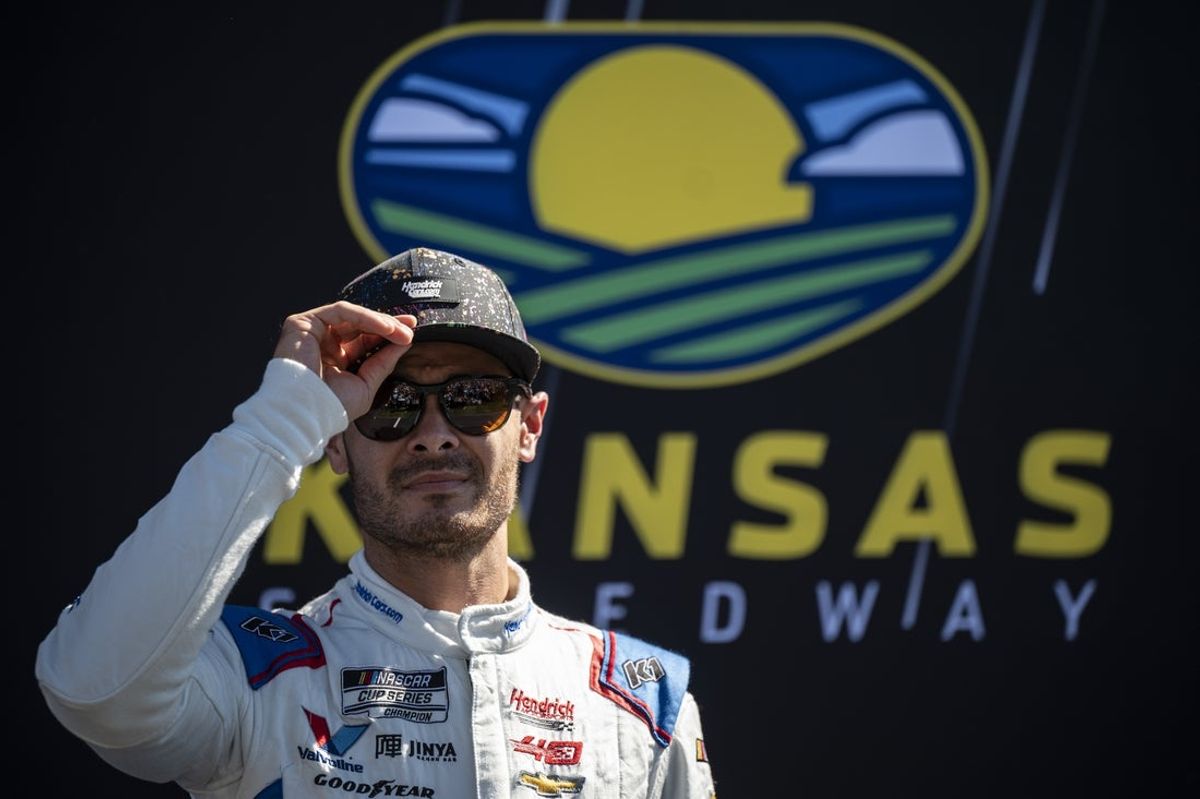 Sep 29, 2024; Kansas City, Kansas, USA; NASCAR Cup Series driver Kyle Larson (5) is introduced before the Hollywood Casino 400 at Kansas Speedway. Mandatory Credit: Amy Kontras-Imagn Images