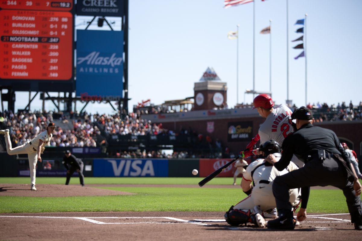 Sep 29, 2024; San Francisco, California, USA; St. Louis Cardinals left fielder Lars Nootbaar (21) strikes out against San Francisco Giants starting pitcher Hayden Birdsong (60) during the first inning at Oracle Park. Mandatory Credit: D. Ross Cameron-Imagn Images