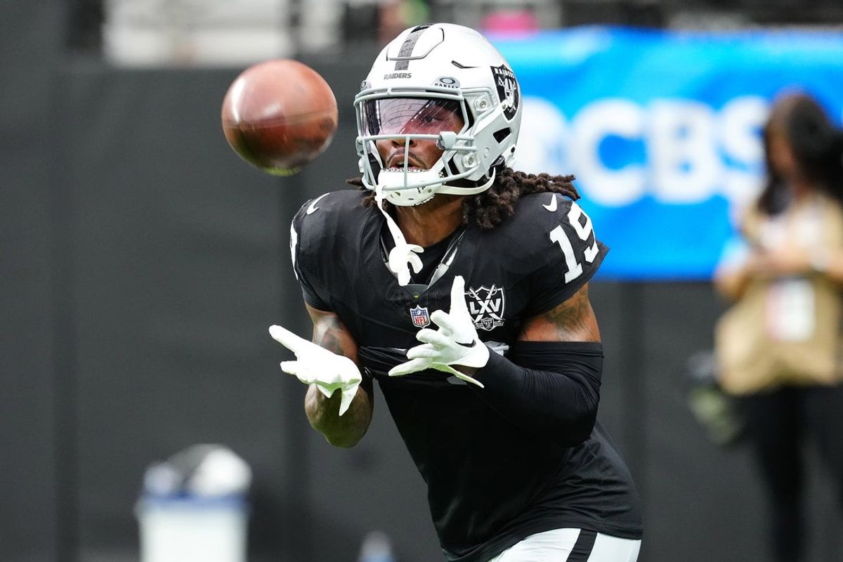 Sep 29, 2024; Paradise, Nevada, USA; Las Vegas Raiders wide receiver DJ Turner (19) warms up before a game against the Cleveland Browns at Allegiant Stadium. Mandatory Credit: Stephen R. Sylvanie-Imagn Images