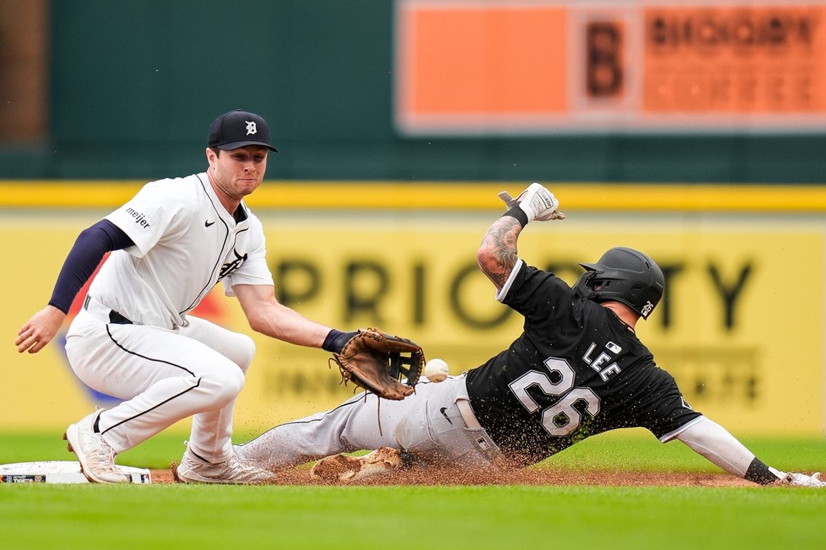 Chicago White Sox catcher Korey Lee (26) steals second base against Detroit Tigers second base Colt Keith (33) during the second inning at Comerica Park in Detroit on Sunday, Sept. 29, 2024.