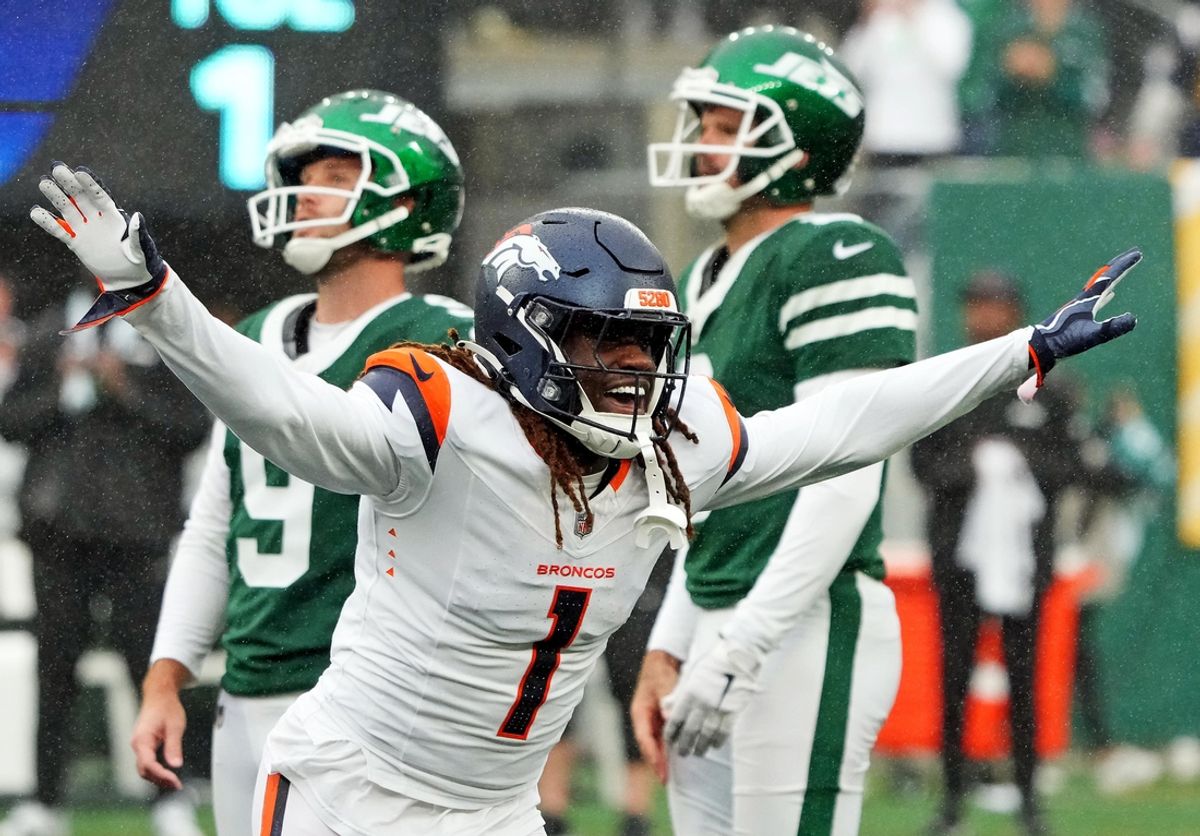 Sep 29, 2024; East Rutherford, New Jersey, USA;  Denver Broncos cornerback Tremon Smith (1) celebrates after New York Jets place kicker Greg Zuerlein (left) missed a last minute field goal at MetLife Stadium. Mandatory Credit: Robert Deutsch-Imagn Images