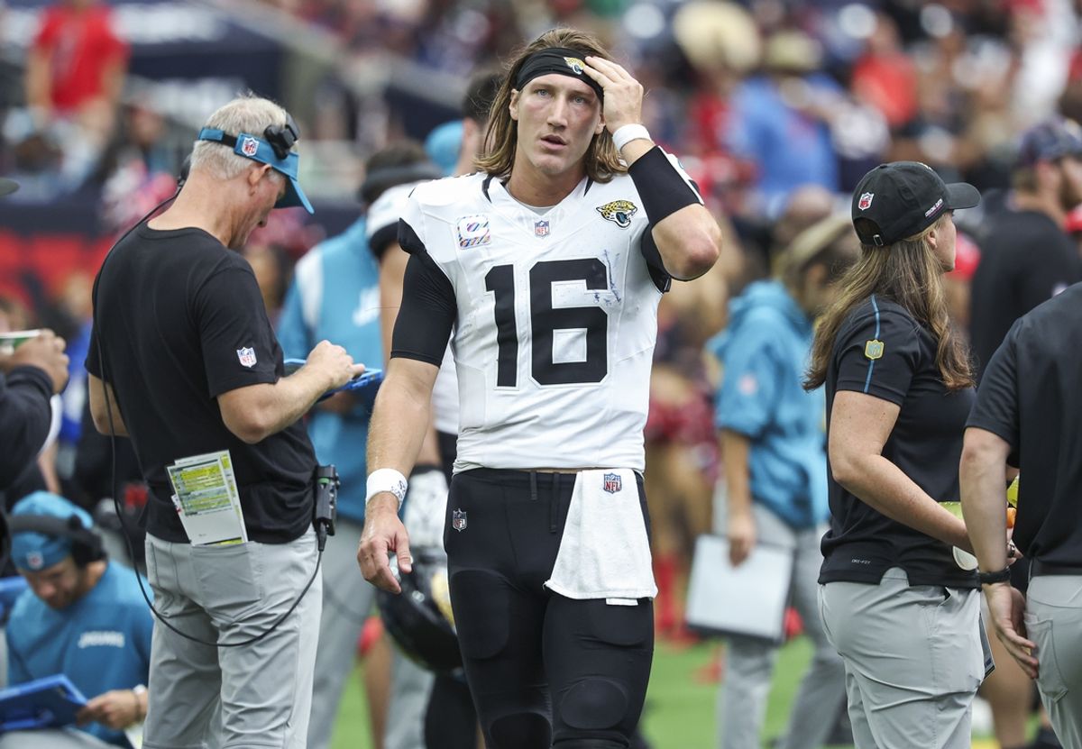 Sep 29, 2024; Houston, Texas, USA; Jacksonville Jaguars quarterback Trevor Lawrence (16) walks on the sideline during the fourth quarter against the Houston Texans at NRG Stadium. Mandatory Credit: Troy Taormina-Imagn Images