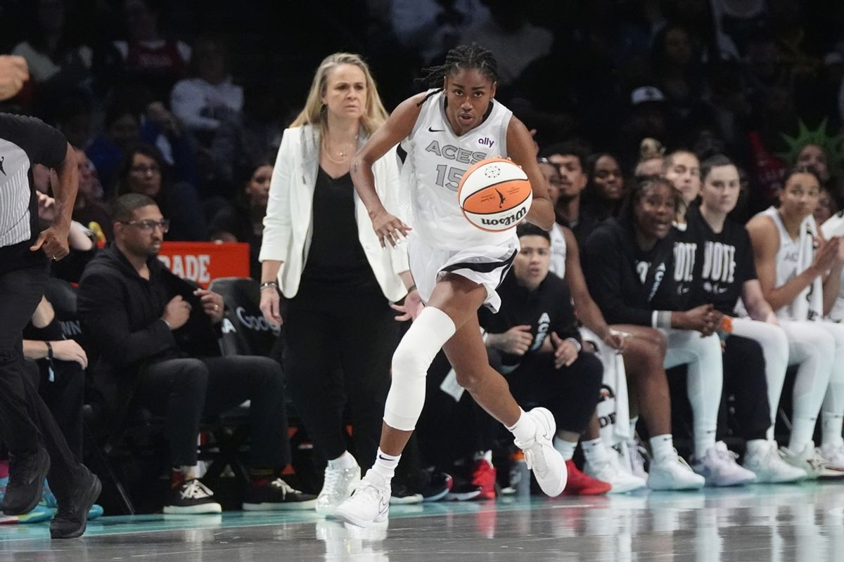 Sep 29, 2024; Brooklyn, New York, USA; Las Vegas Aces guard Tiffany Hayes (15) dribbles the ball up the court against the New York Liberty during game one of the 2024 WNBA Semi-finals at Barclays Center. Mandatory Credit: Gregory Fisher-Imagn Images