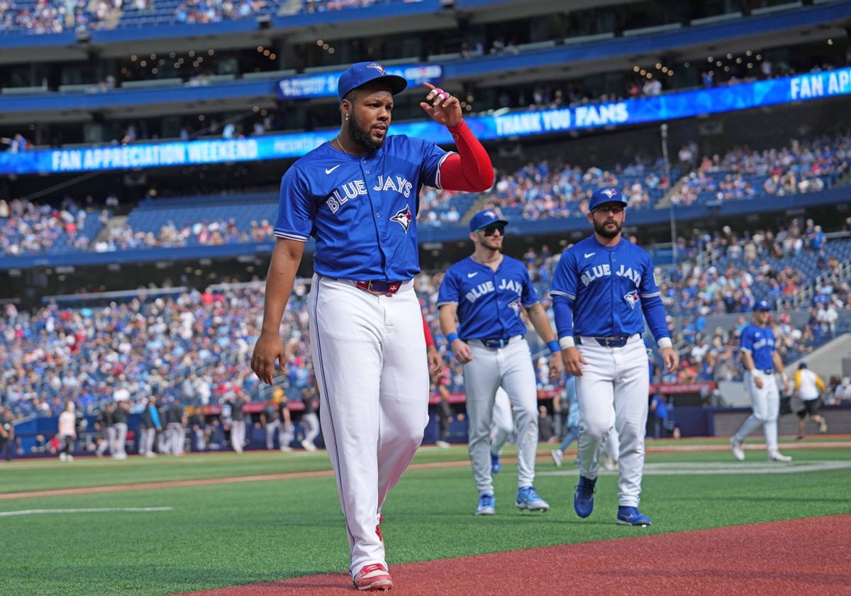 Sep 29, 2024; Toronto, Ontario, CAN; Toronto Blue Jays designated hitter Vladimir Guerrero Jr. (27) walks back to the dugout before the start of a game against the Miami Marlins at Rogers Centre. Mandatory Credit: Nick Turchiaro-Imagn Images