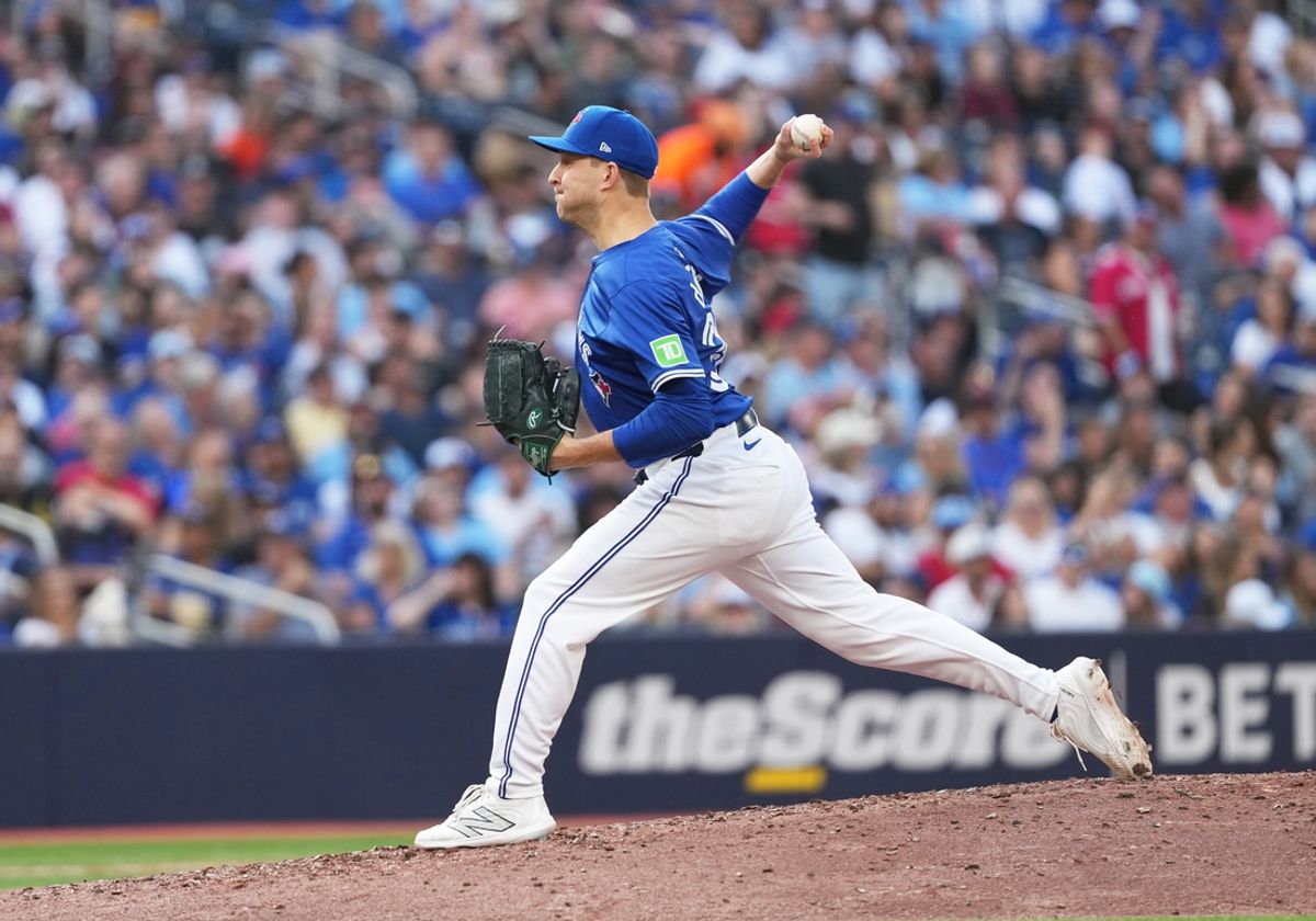 Sep 29, 2024; Toronto, Ontario, CAN; Toronto Blue Jays relief pitcher Brett de Geus (31) throws a pitch against the Miami Marlins during the sixth inning at Rogers Centre. Mandatory Credit: Nick Turchiaro-Imagn Images
