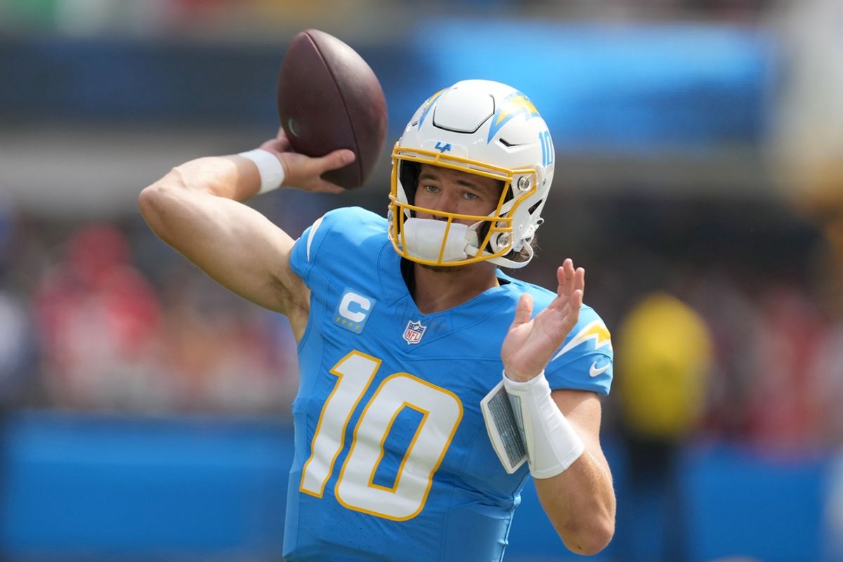 Sep 29, 2024; Inglewood, California, USA; Los Angeles Chargers quarterback Justin Herbert (10) throws the ball against the Kansas City Chiefs at SoFi Stadium. Mandatory Credit: Kirby Lee-Imagn Images