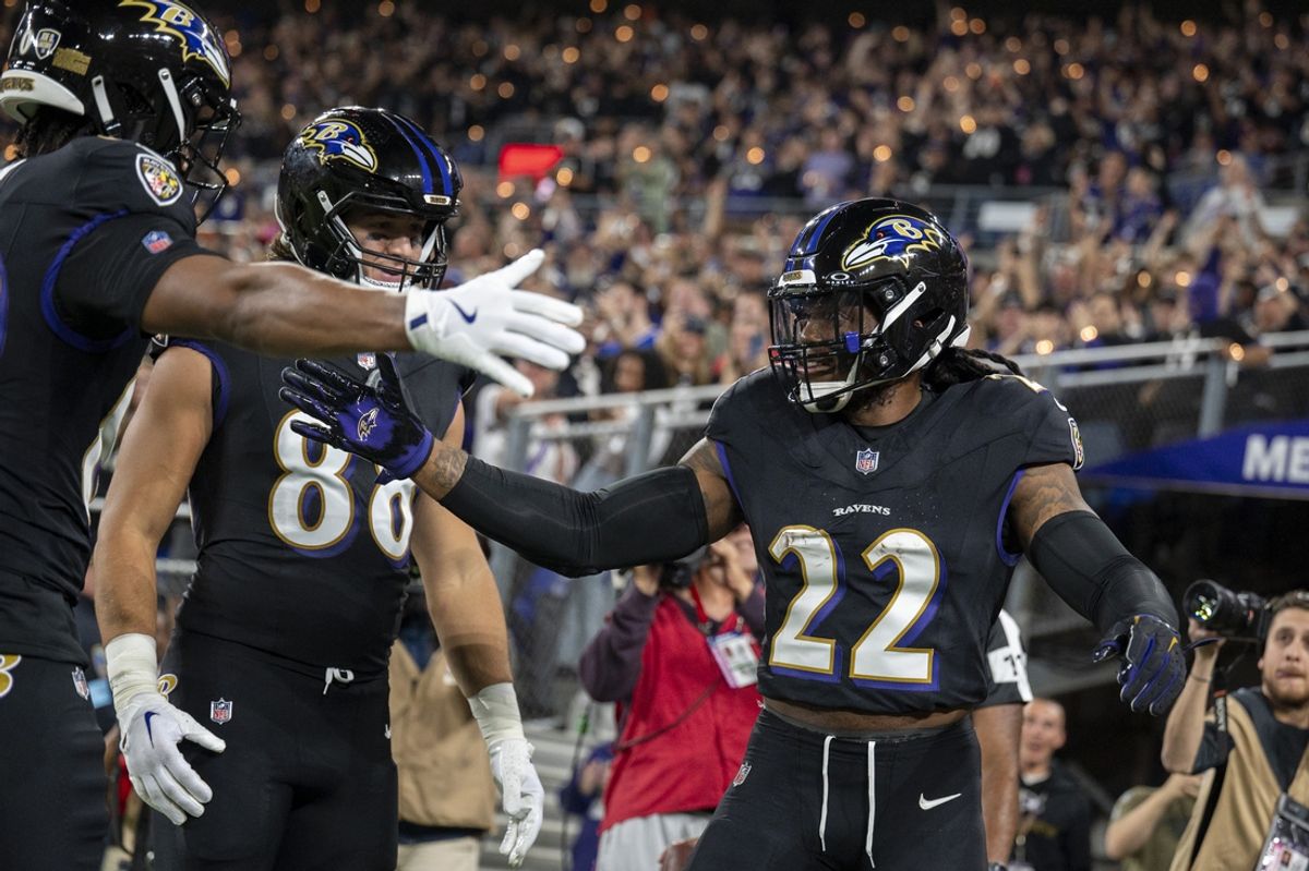 Sep 29, 2024; Baltimore, Maryland, USA;  Baltimore Ravens running back Derrick Henry (22) celebrates with teammates after scoring during the second quarter against the Buffalo Bills at M&T Bank Stadium. Mandatory Credit: Tommy Gilligan-Imagn Images