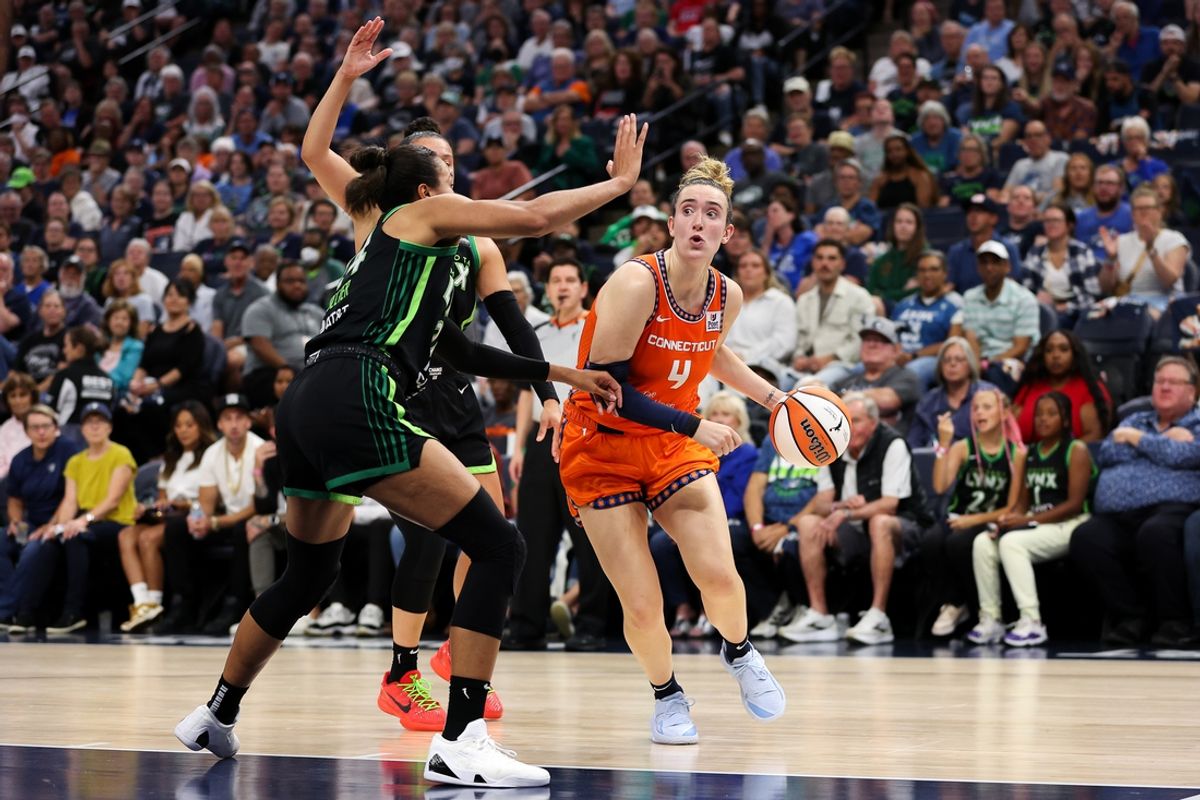 Sep 29, 2024; Minneapolis, Minnesota, USA; Connecticut Sun guard Marina Mabrey (4) works towards the basket as Minnesota Lynx forward Napheesa Collier (24) defends during the first half of game one of the 2024 WNBA Semi-finals at Target Center. Mandatory Credit: Matt Krohn-Imagn Images