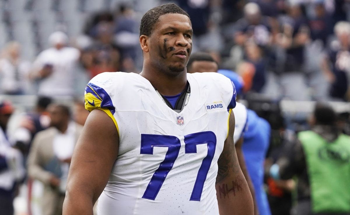 Sep 29, 2024; Chicago, Illinois, USA; Los Angeles Rams offensive tackle Alaric Jackson (77) in a game against the Chicago Bears at Soldier Field. Mandatory Credit: David Banks-Imagn Images