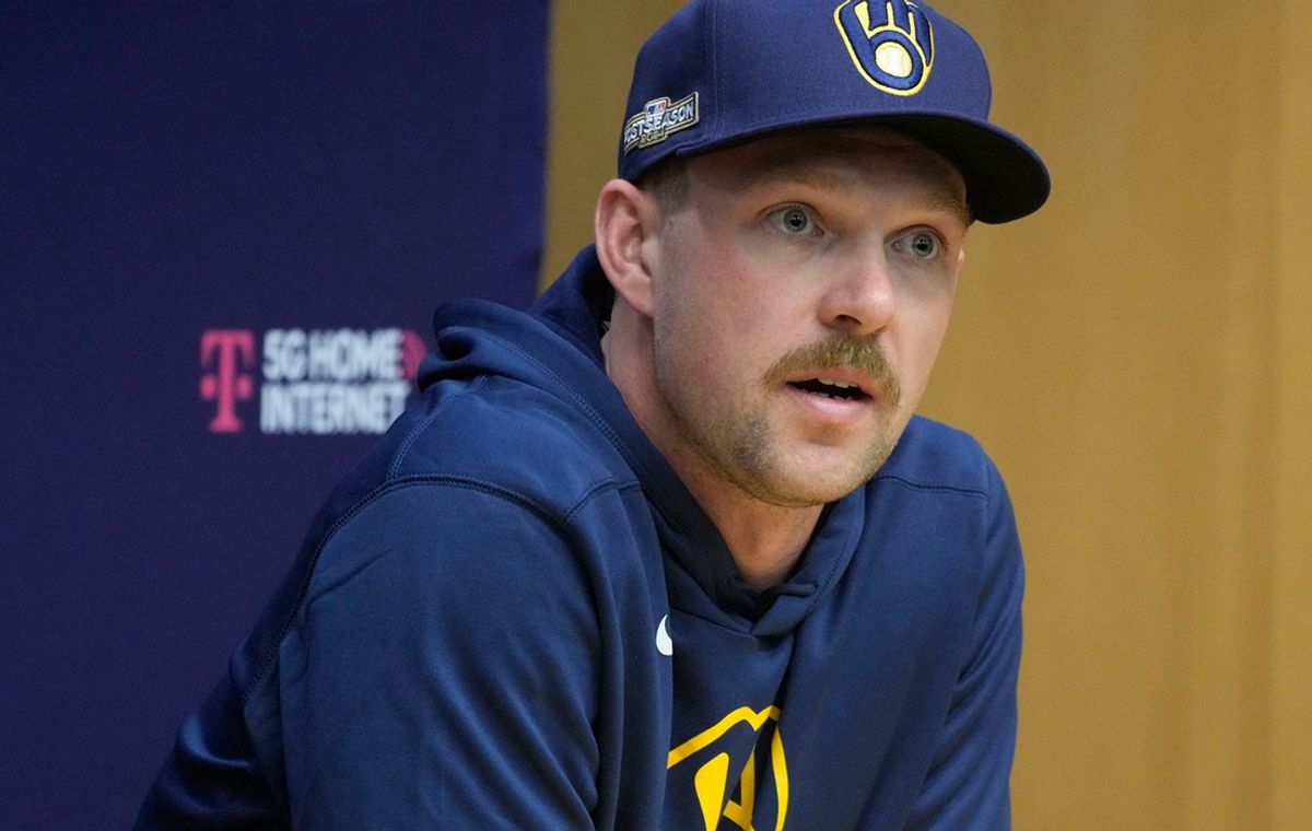 Milwaukee Brewers Rhys Hoskins answers a question during a press conference before the Tuesday Milwaukee Brewers National League Wild Card playoff series at American Family Field in Milwaukee on Monday, Sept. 30, 2024.
