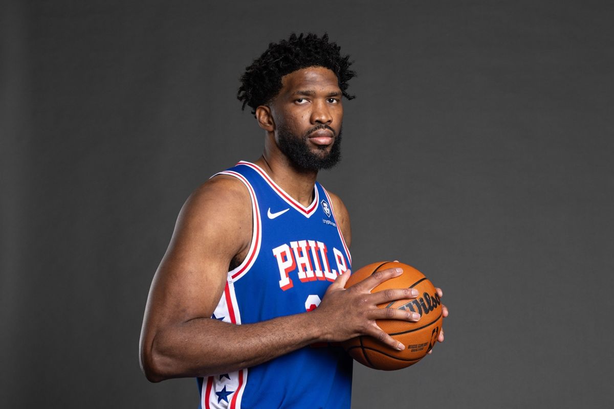 Sep 30, 2024; Camden, NJ, USA; Philadelphia 76ers center Joel Embiid (21) poses for a photo on media day at the Philadelphia 76ers Training Complex. Mandatory Credit: Bill Streicher-Imagn Images