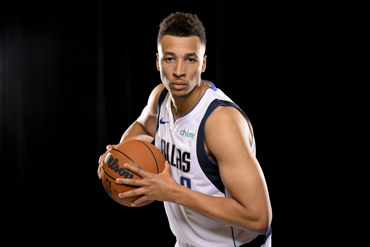 Sep 30, 2024; Dallas, TX, USA; Dallas Mavericks guard Dante Exum (0) poses for a photo during the 2024 Dallas Mavericks media day. Mandatory Credit: Jerome Miron-Imagn Images