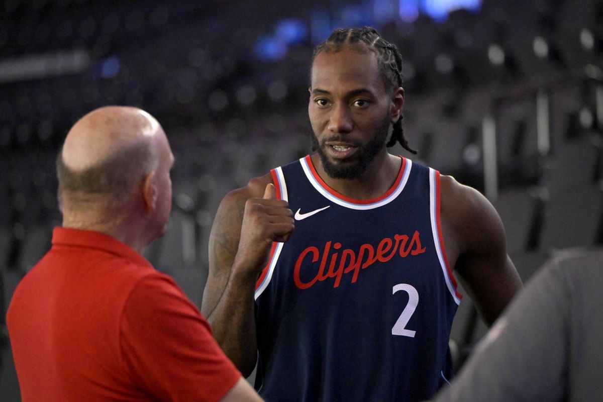Sep 30, 2024; Inglewood, CA, USA;  Los Angeles Clippers forward Kawhi Leonard (2) talks with team owner Steve Ballmer during media day at Intuit Dome. Mandatory Credit: Jayne Kamin-Oncea-Imagn Images