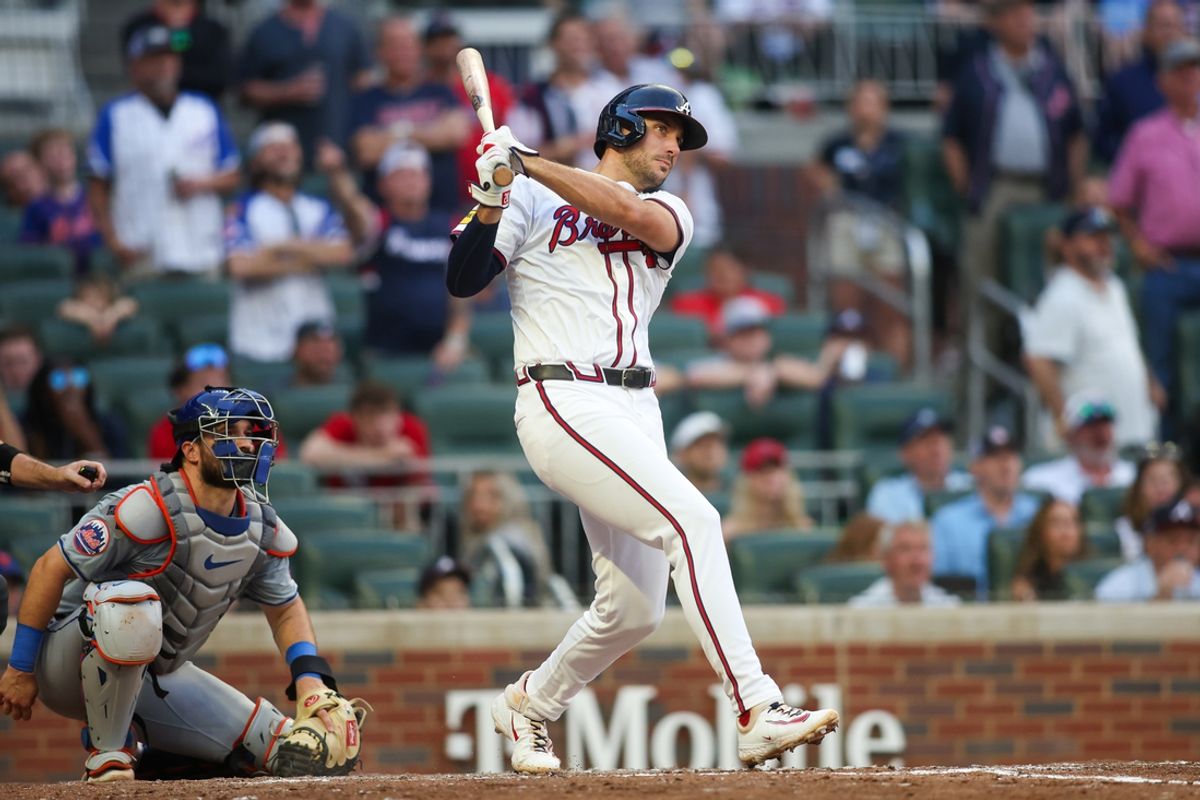Sep 30, 2024; Atlanta, Georgia, USA; Atlanta Braves first baseman Matt Olson (28) hits a single against the New York Mets in the seventh inning at Truist Park. Mandatory Credit: Brett Davis-Imagn Images