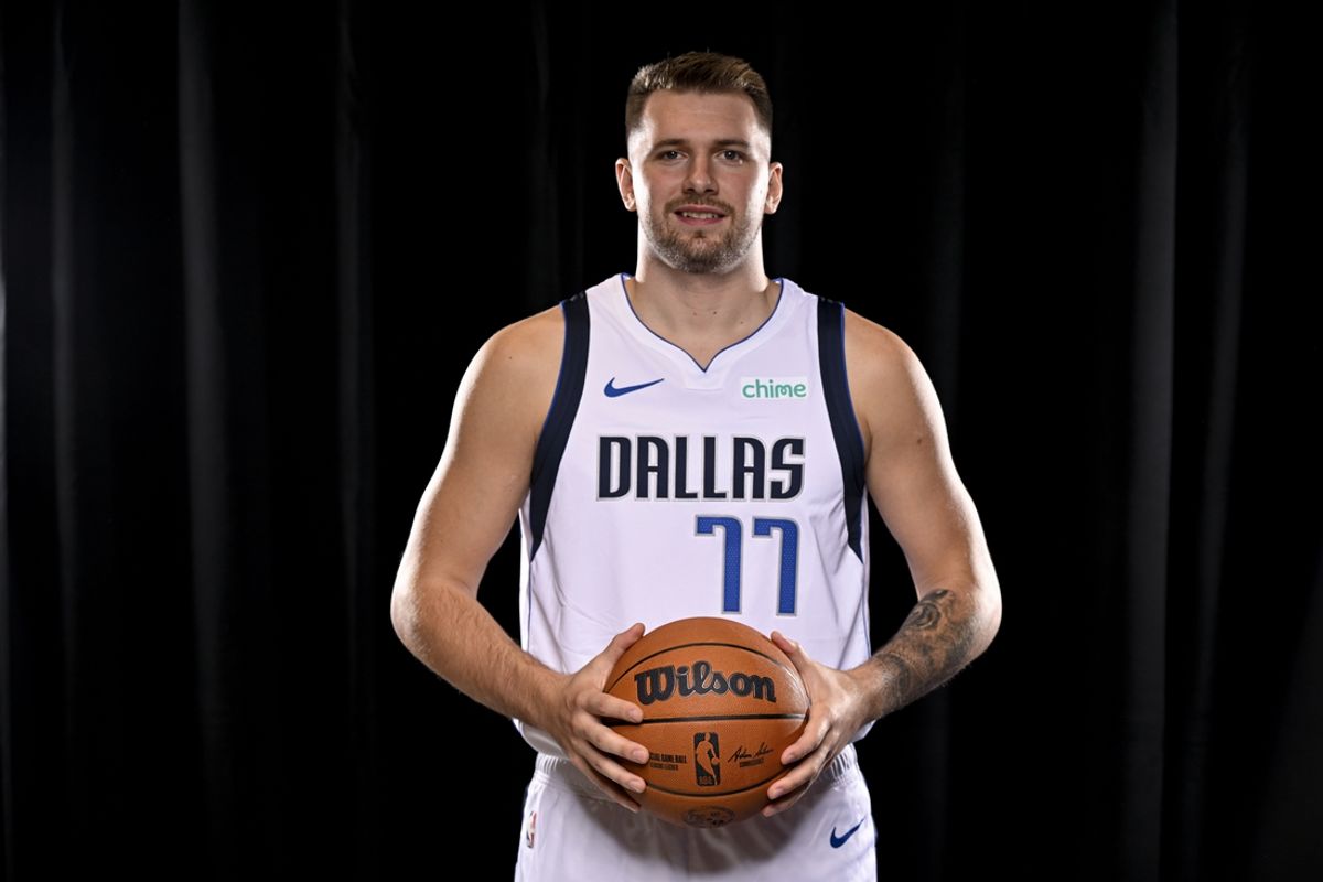 Sep 30, 2024; Dallas, TX, USA; Dallas Mavericks guard Luka Doncic (77) poses for a photo during the 2024 Dallas Mavericks media day. Mandatory Credit: Jerome Miron-Imagn Images