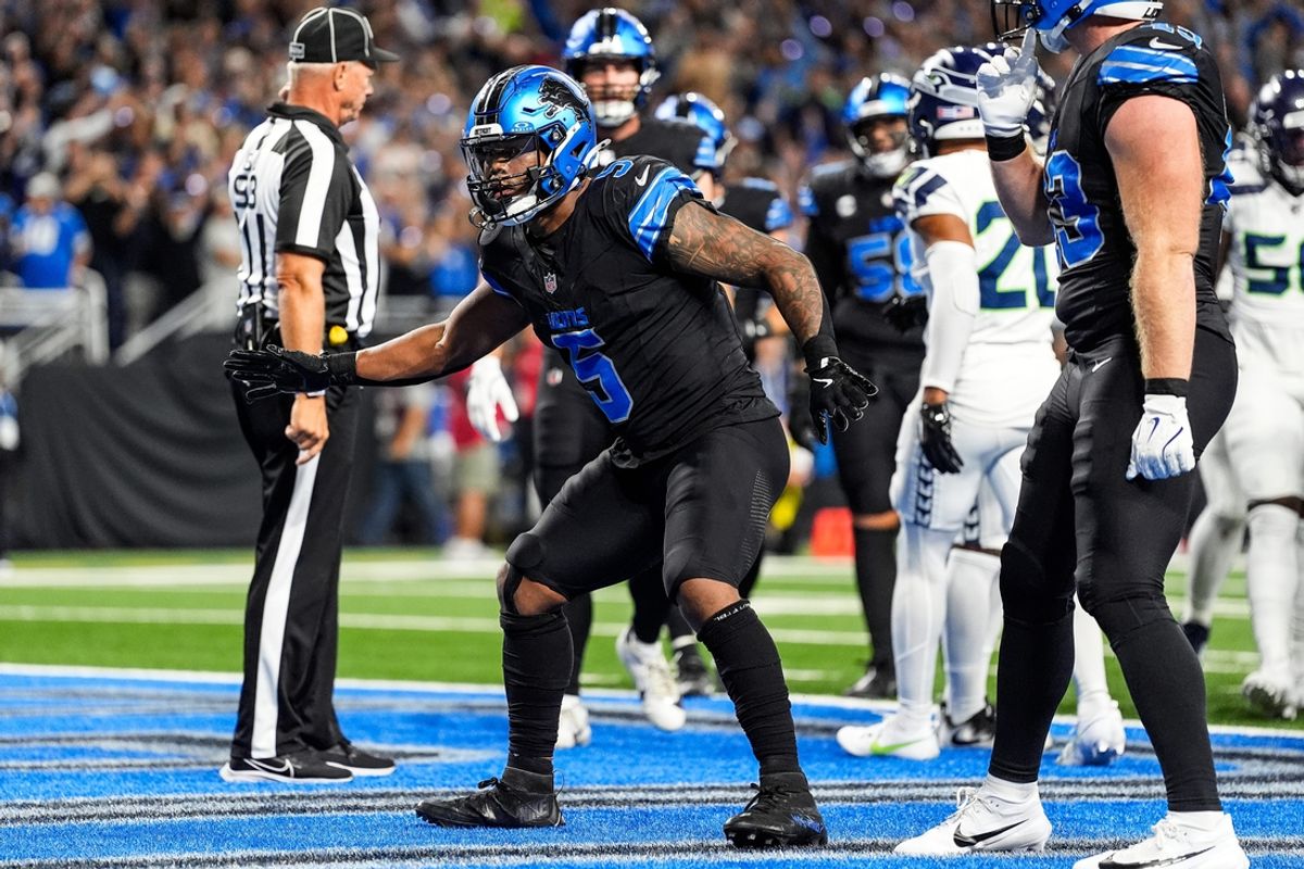 Detroit Lions running back David Montgomery (5) celebrates a touchdown against Seattle Seahawks during the first half at Ford Field in Detroit on Monday, Sept. 30, 2024.