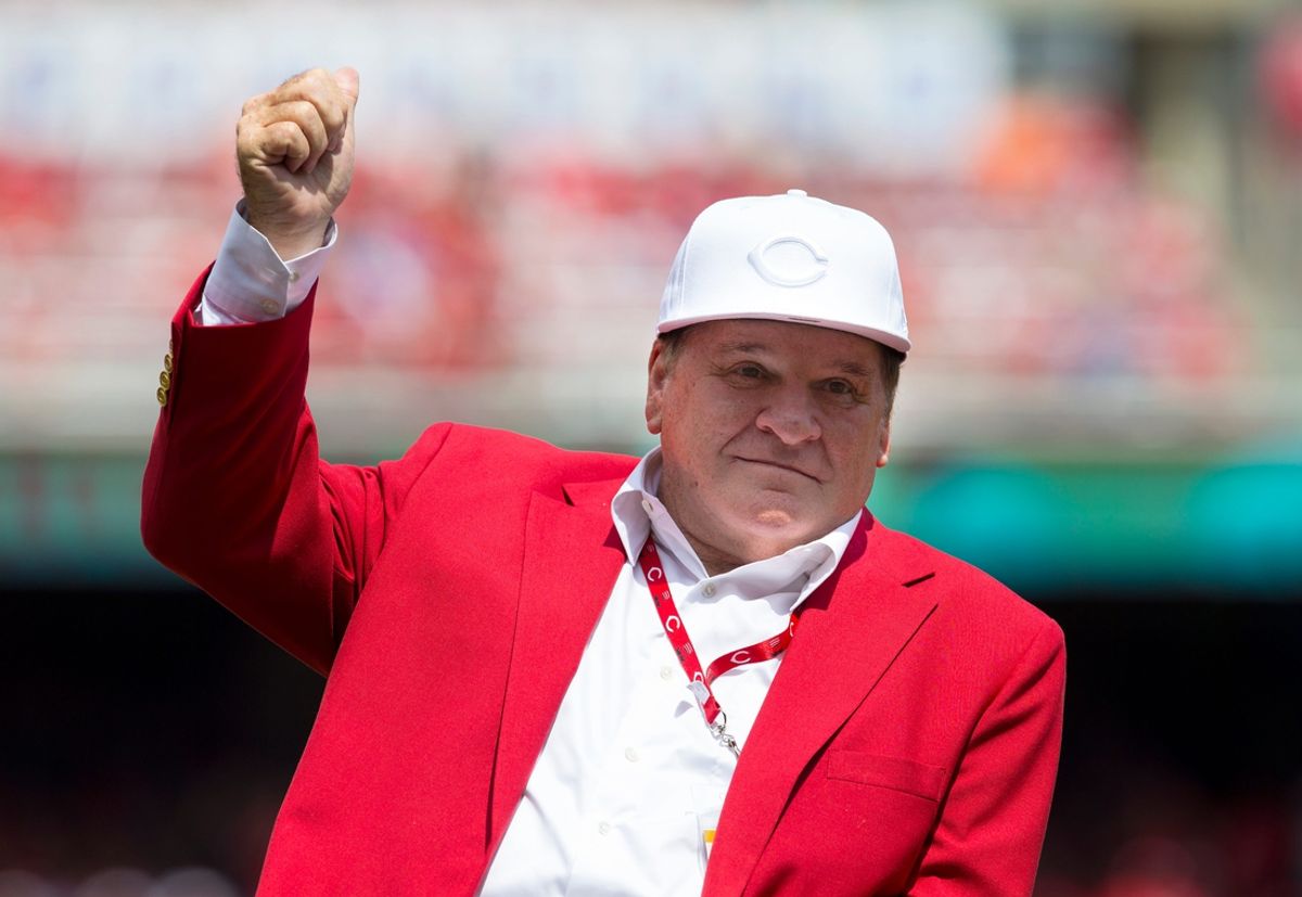 Cincinnati Reds hall of famer Pete Rose gives a thumbs up to the fans as he is introduced during a pregame ceremony for the unveiling of Pete Rose's bronze statue being installed outside the stadium before the MLB National League game between the Cincinnati Reds and the Los Angeles Dodgers at Great American Ball Park in downtown Cincinnati on Saturday, June 17, 2017.