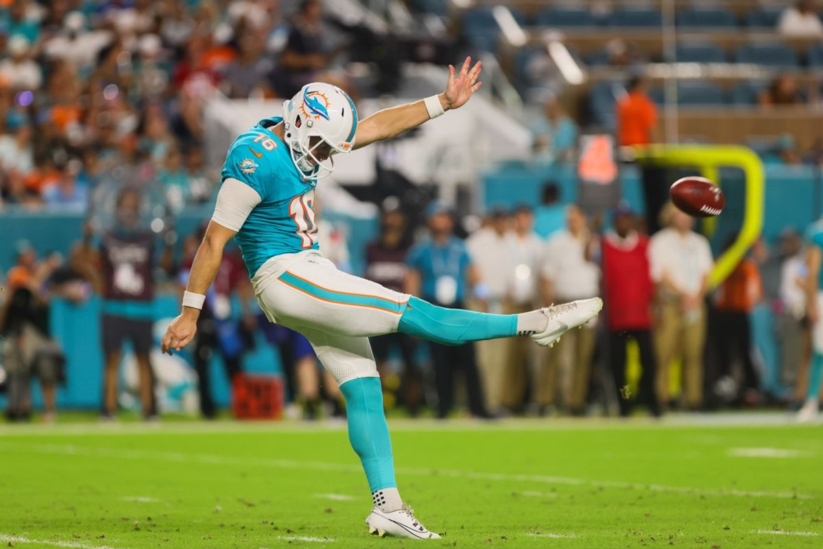 Sep 30, 2024; Miami Gardens, Florida, USA; Miami Dolphins punter Jake Bailey (16) punts against the Tennessee Titans during the third quarter at Hard Rock Stadium. Mandatory Credit: Sam Navarro-Imagn Images