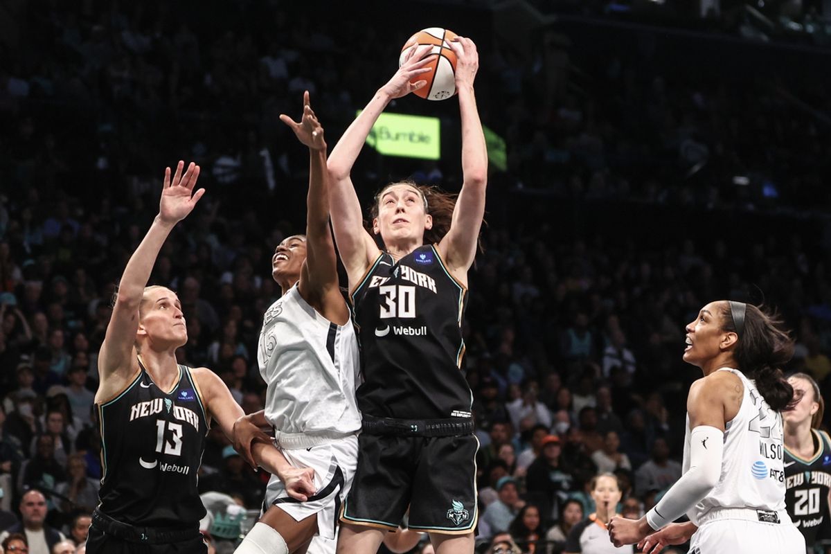 Oct 1, 2024; Brooklyn, New York, USA; New York Liberty forward Breanna Stewart (30) grabs a rebound in the first quarter against the Las Vegas Aces during game two of the 2024 WNBA Semi-finals at Barclays Center. Mandatory Credit: Wendell Cruz-Imagn Images