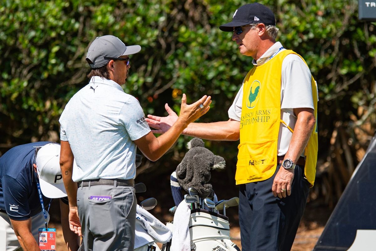 Rickie Fowler talks to his caddie during the Sanderson Farms Championship Pro-Am at the Country Club of Jackson in Jackson, Miss., on Wednesday, Oct. 2, 2024.