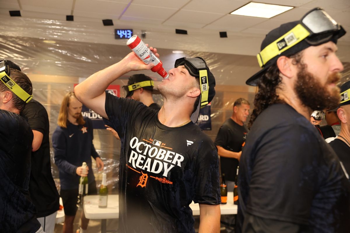 Oct 2, 2024; Houston, Texas, USA; Members of the Detroit Tigers celebrate in the locker room after defeating the Houston Astros in game two of the Wildcard round for the 2024 MLB Playoffs at Minute Maid Park. Mandatory Credit: Thomas Shea-Imagn Images